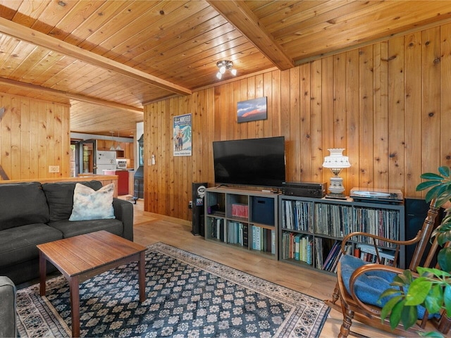 1716 US Route 2, Moretown, VT 05676 - living area featuring a wooden ceiling with exposed beams, wooden walls, and wood finished floors