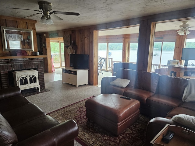 596 Endicott St, Laconia, NH 03246 - living area with ceiling fan and wooden walls