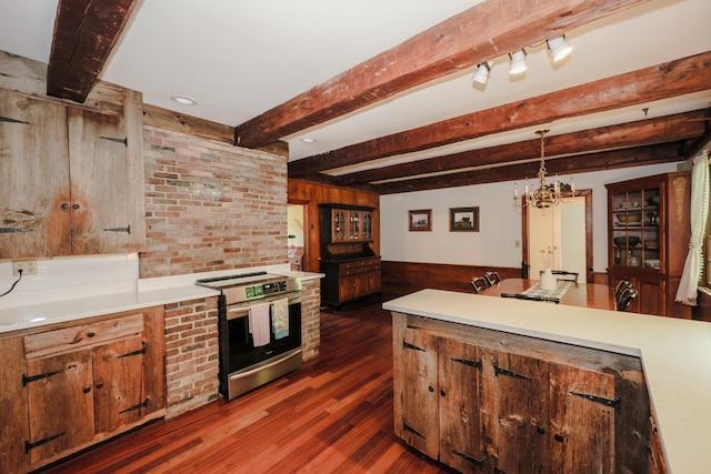 1448 Bound Tree Rd, Hopkinton, NH 03229 - kitchen with stainless steel electric stove, beam ceiling, dark wood-style flooring, wooden walls, and light countertops