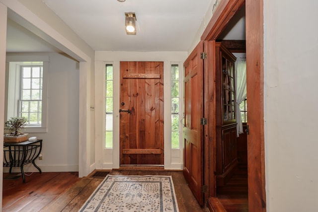 1448 Bound Tree Rd, Hopkinton, NH 03229 - entryway with dark wood finished floors and baseboards