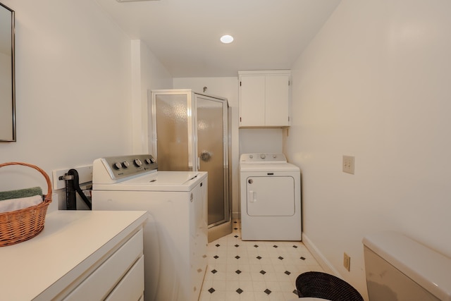 1448 Bound Tree Rd, Hopkinton, NH 03229 - laundry room featuring separate washer and dryer, cabinet space, and light flooring