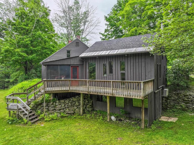 1448 Bound Tree Rd, Hopkinton, NH 03229 - rear view of property featuring a sunroom, a chimney, stairway, a yard, and a shingled roof