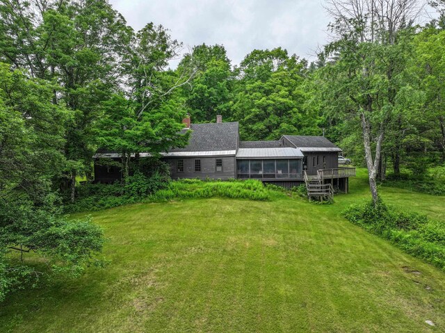 1448 Bound Tree Rd, Hopkinton, NH 03229 - view of green lawn featuring a deck and a wooded view