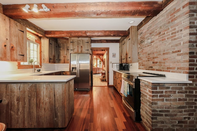 1448 Bound Tree Rd, Hopkinton, NH 03229 - kitchen with stainless steel appliances, dark wood finished floors, beam ceiling, a peninsula, and light countertops
