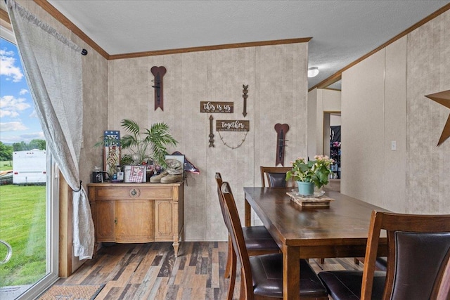 908 Gilbert Rd, Williamstown, VT 05679 - dining room featuring wood finished floors and ornamental molding