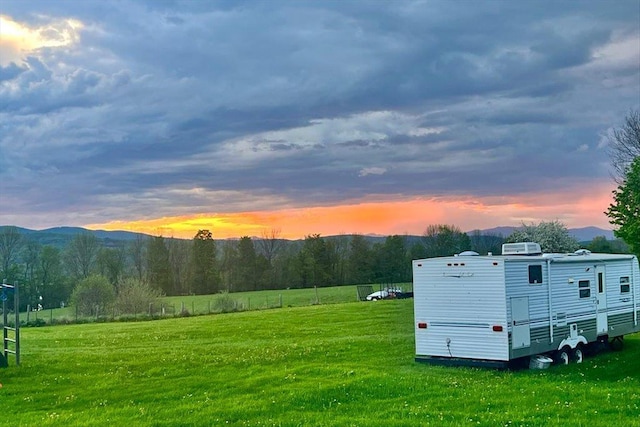 908 Gilbert Rd, Williamstown, VT 05679 - yard at dusk with a lawn