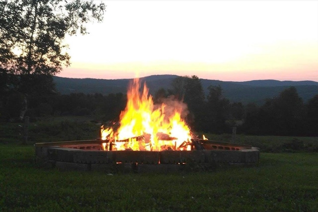 908 Gilbert Rd, Williamstown, VT 05679 - view of property's community with a fire pit and a mountain view