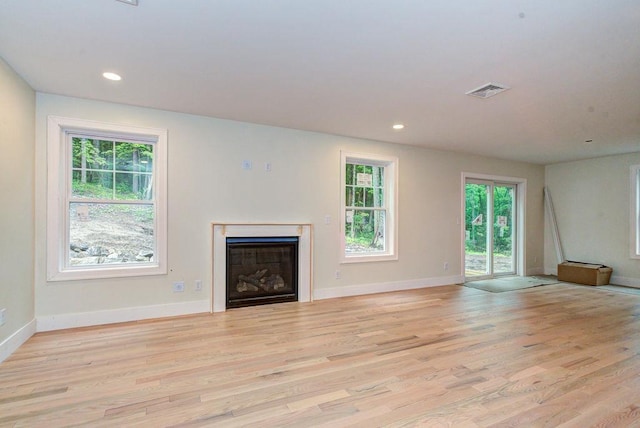 19 Speare Rd Unit B, Hudson, NH 03051 - unfurnished living room featuring a fireplace, light wood-style flooring, and recessed lighting