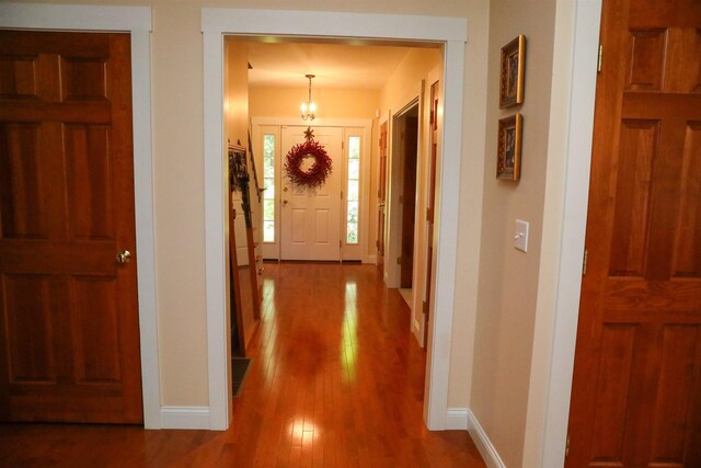 2 Parker Farm Ln, Amherst, NH 03031 - corridor featuring baseboards and wood finished floors