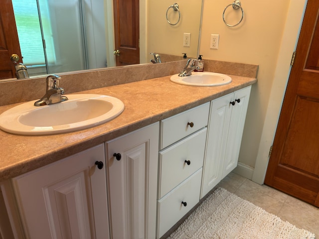 2 Parker Farm Ln, Amherst, NH 03031 - bathroom featuring double vanity and tile patterned flooring