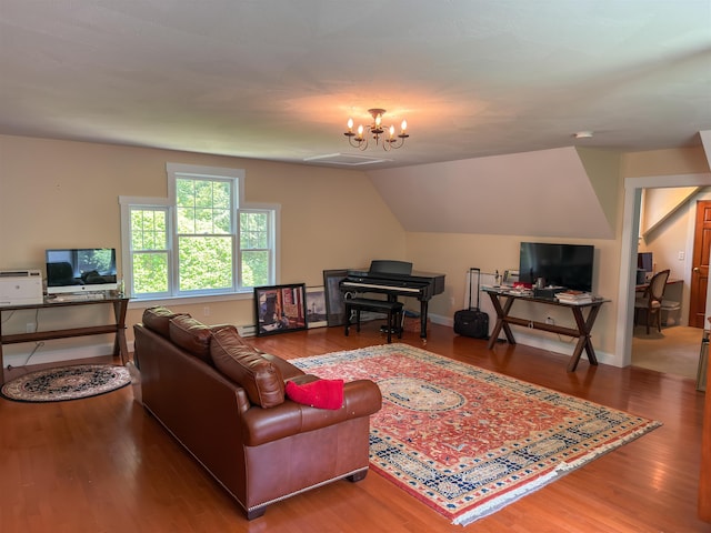2 Parker Farm Ln, Amherst, NH 03031 - living area featuring a desk, wood finished floors, a chandelier, and vaulted ceiling