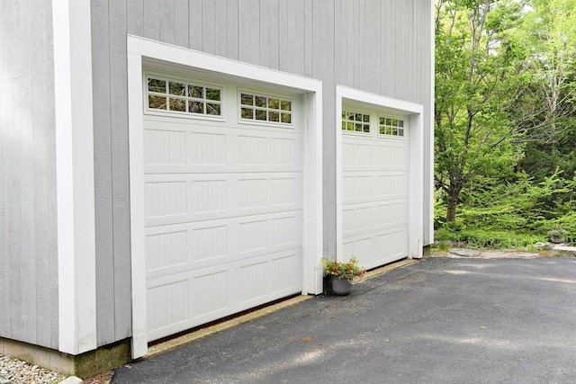 2 Parker Farm Ln, Amherst, NH 03031 - garage featuring driveway