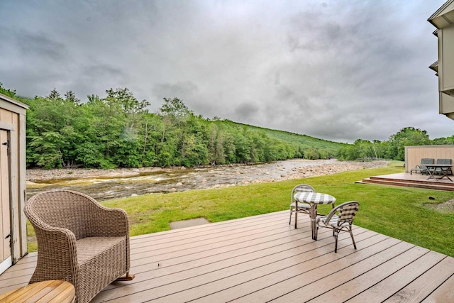 58 Bunker Ln Unit 3, Lincoln, NH 03251 - deck with a yard