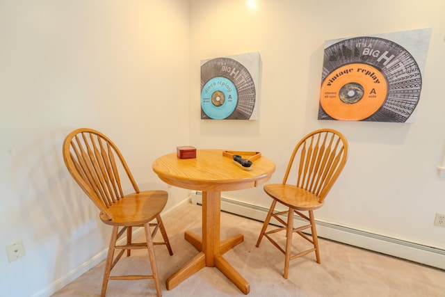 58 Bunker Ln Unit 3, Lincoln, NH 03251 - carpeted dining space featuring a baseboard radiator and baseboards