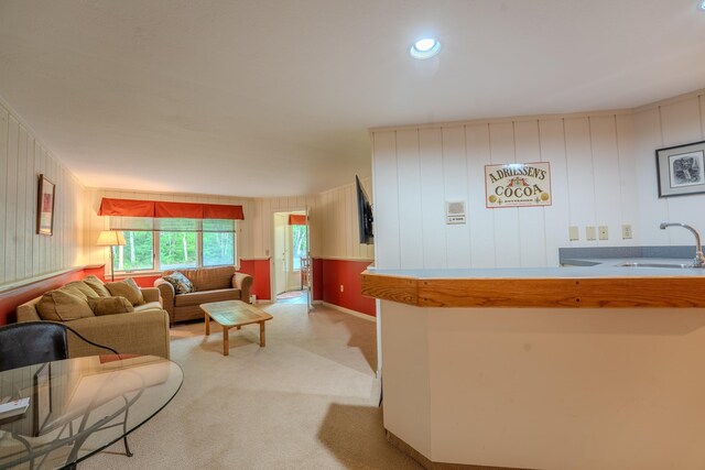 58 Bunker Ln Unit 3, Lincoln, NH 03251 - living room featuring light carpet