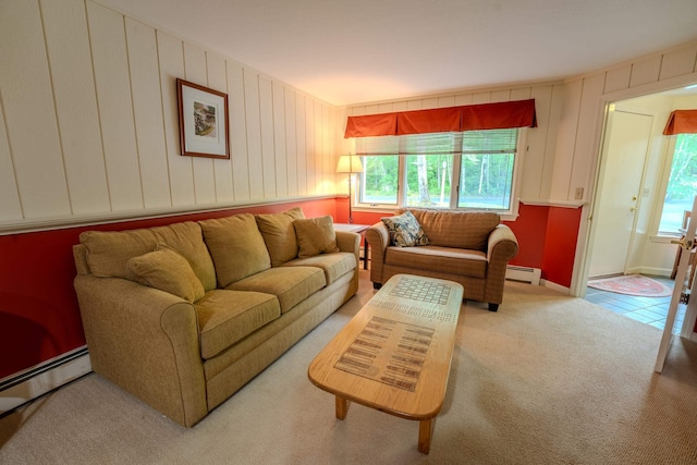 58 Bunker Ln Unit 3, Lincoln, NH 03251 - living room with a baseboard radiator, plenty of natural light, and carpet floors