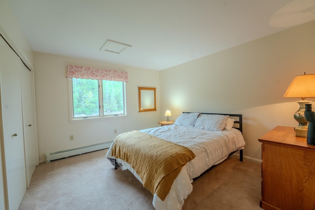 58 Bunker Ln Unit 3, Lincoln, NH 03251 - bedroom with baseboard heating, attic access, light colored carpet, and a closet