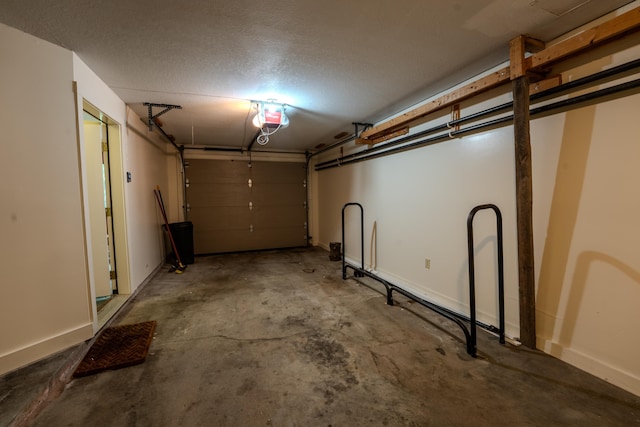 58 Bunker Ln Unit 3, Lincoln, NH 03251 - garage featuring a garage door opener