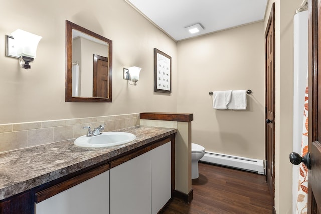 105 Timberline Rd S Unit L8, Killington, VT 05751 - full bathroom with a baseboard radiator, vanity, and wood finished floors