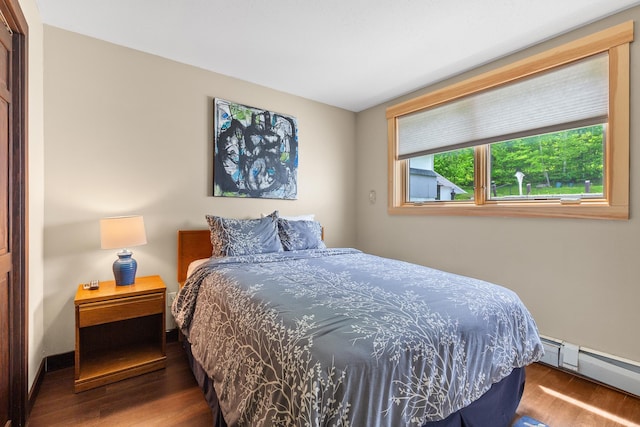 105 Timberline Rd S Unit L8, Killington, VT 05751 - bedroom with baseboard heating and wood finished floors