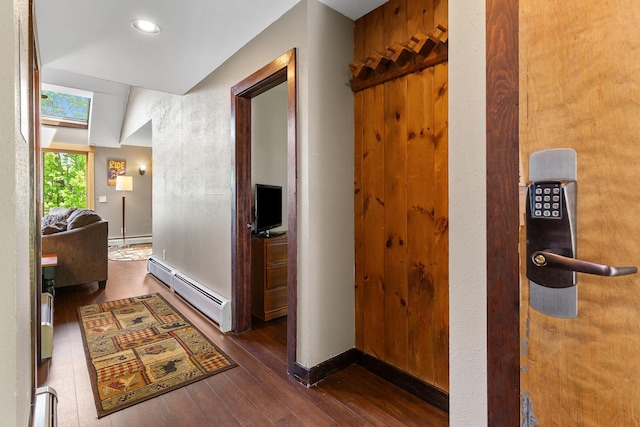 105 Timberline Rd S Unit L8, Killington, VT 05751 - hallway with a baseboard heating unit, wood-type flooring, a skylight, and recessed lighting