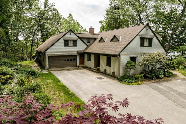 30 Old Piscataqua Rd, Durham, NH 03824 - shingle-style home with concrete driveway, a chimney, and roof with shingles