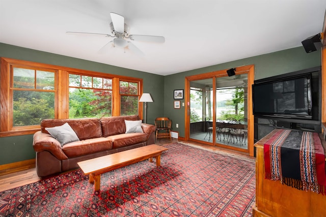 30 Old Piscataqua Rd, Durham, NH 03824 - living area featuring healthy amount of natural light, a ceiling fan, and wood finished floors