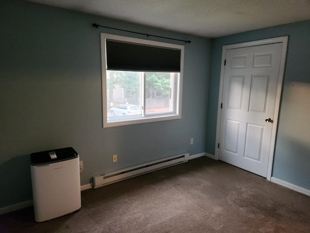17 Burns Ave Unit 2, Concord, NH 03301 - unfurnished bedroom featuring baseboard heating, carpet, and a textured ceiling