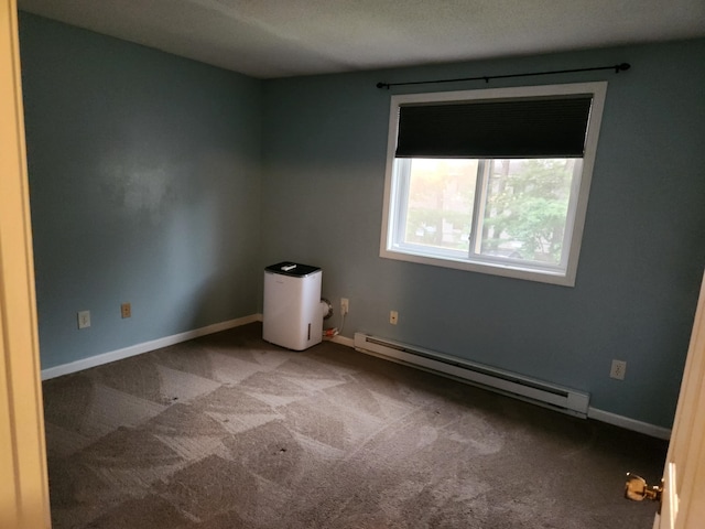 17 Burns Ave Unit 2, Concord, NH 03301 - empty room featuring a baseboard heating unit and carpet