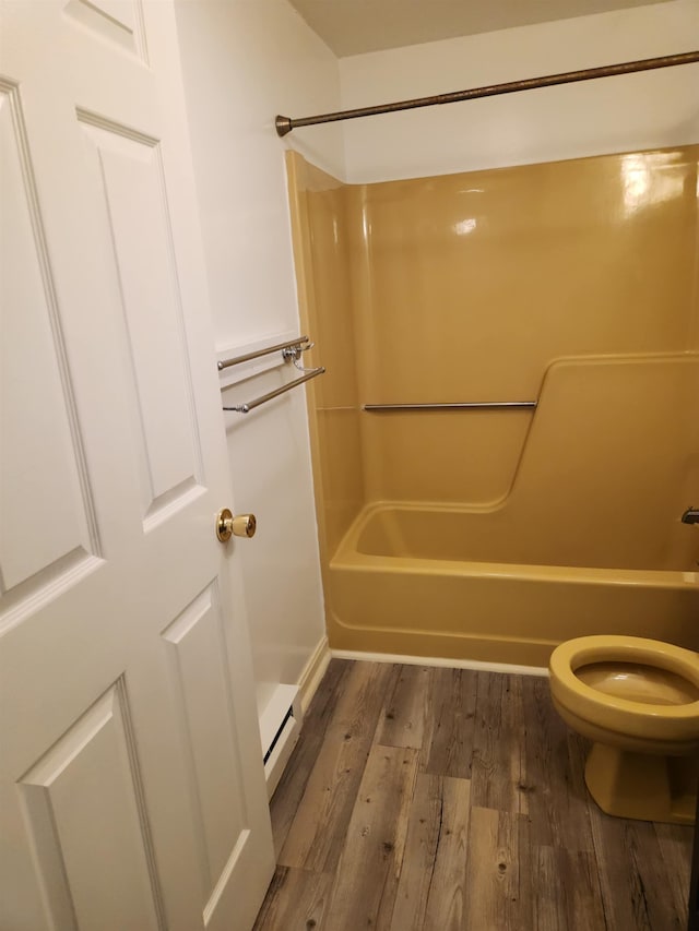 17 Burns Ave Unit 2, Concord, NH 03301 - full bath featuring wood finished floors, shower / bath combination, and a baseboard radiator