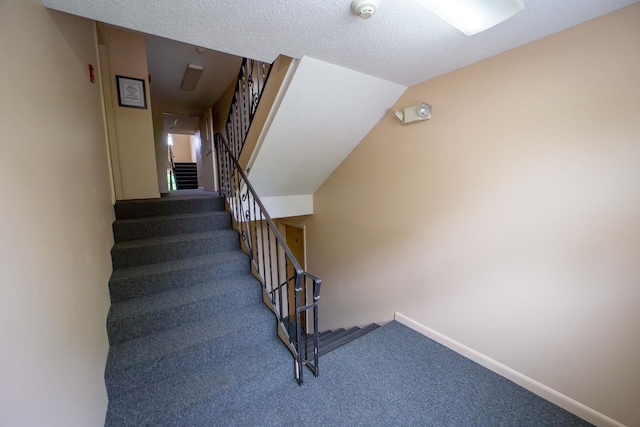 30 Beech St Unit 4B, Bristol, NH 03222 - staircase with carpet floors and baseboards