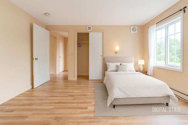 30 Beech St Unit 4B, Bristol, NH 03222 - bedroom featuring light wood-type flooring and baseboards