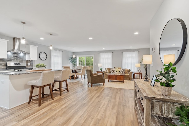 7A Terraceview Dr, Hudson, NH 03051 - living room with light wood-style floors and recessed lighting
