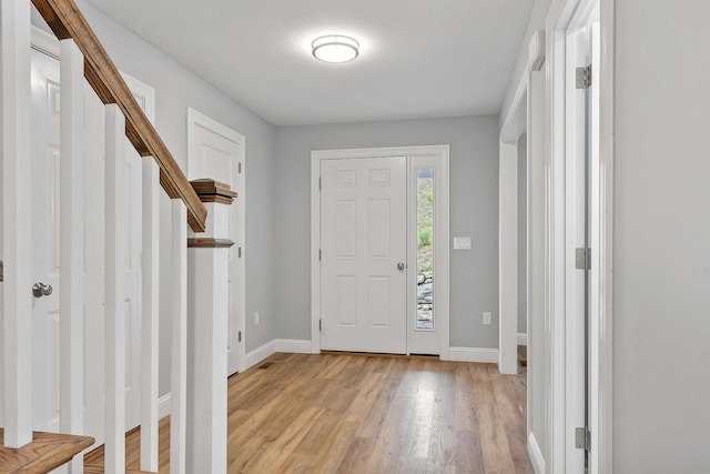 7A Terraceview Dr, Hudson, NH 03051 - entryway featuring light wood finished floors and stairs