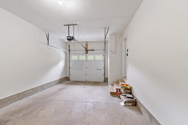 7A Terraceview Dr, Hudson, NH 03051 - garage featuring a garage door opener