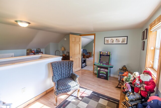 83 Tamworth Rd, Tamworth, NH 03886 - sitting room with wood finished floors and vaulted ceiling
