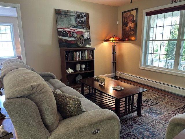 142 Eagle Shore Rd, Moultonborough, NH 03254 - living room featuring healthy amount of natural light and a baseboard heating unit