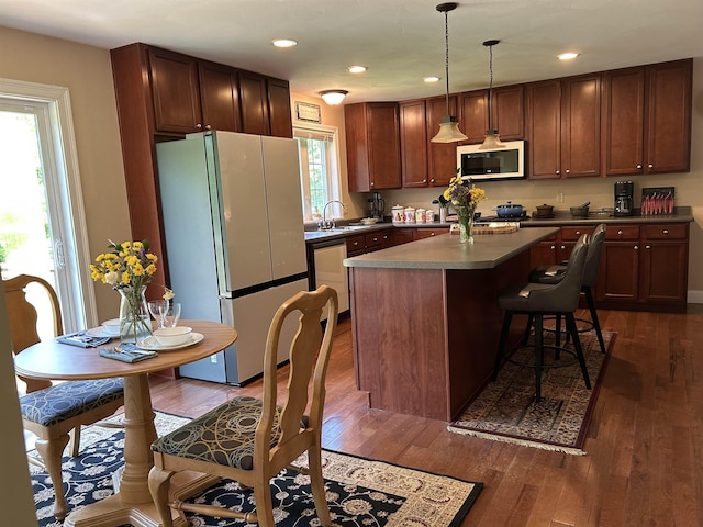 142 Eagle Shore Rd, Moultonborough, NH 03254 - kitchen with freestanding refrigerator, a center island, dark wood-type flooring, dishwashing machine, and recessed lighting