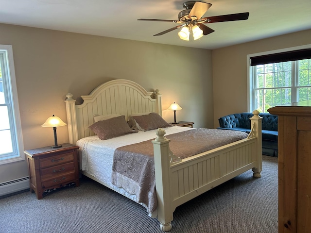 142 Eagle Shore Rd, Moultonborough, NH 03254 - bedroom with carpet flooring, multiple windows, a ceiling fan, and baseboard heating