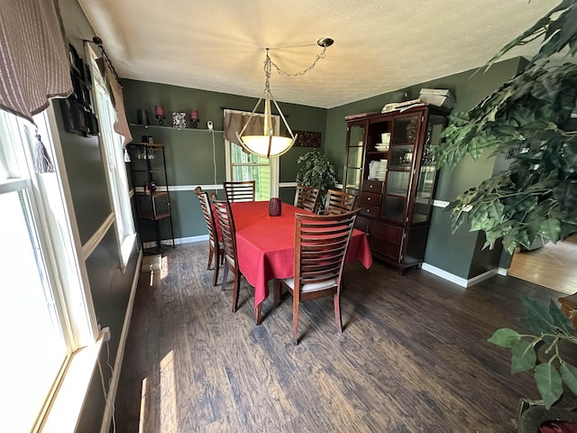 2 Cobblestone Pl, Merrimack, NH 03054 - dining area featuring dark wood finished floors and baseboards