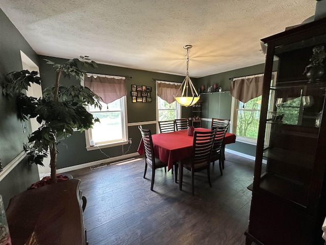 2 Cobblestone Pl, Merrimack, NH 03054 - dining room with a textured ceiling and dark wood-style floors