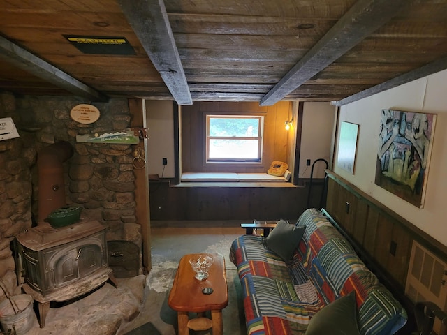 49 Tabor Cir, Albany, NH 03818 - living room featuring a wooden ceiling with exposed beams and unfinished concrete flooring