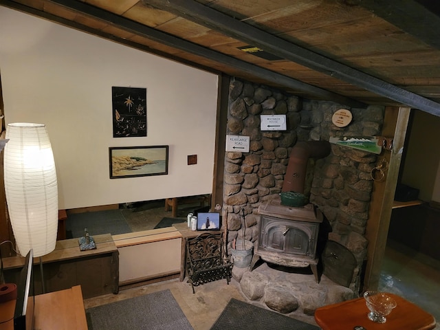 49 Tabor Cir, Albany, NH 03818 - living room with a wood stove and wooden ceiling