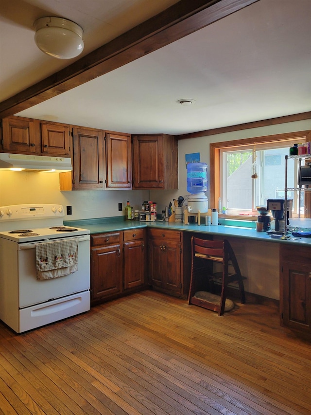 49 Tabor Cir, Albany, NH 03818 - kitchen featuring white electric range, under cabinet range hood, beam ceiling, light wood finished floors, and a desk