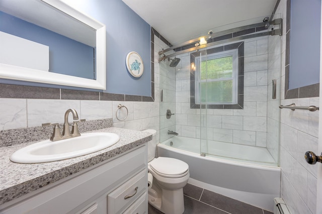 8 Jakes Ln, Merrimack, NH 03054 - bathroom featuring tile walls, vanity, a baseboard heating unit, combined bath / shower with glass door, and tile patterned floors