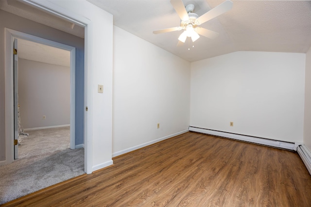 8 Jakes Ln, Merrimack, NH 03054 - unfurnished room with vaulted ceiling, wood finished floors, ceiling fan, and baseboard heating