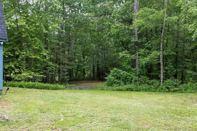 8 Jakes Ln, Merrimack, NH 03054 - view of yard with a forest view