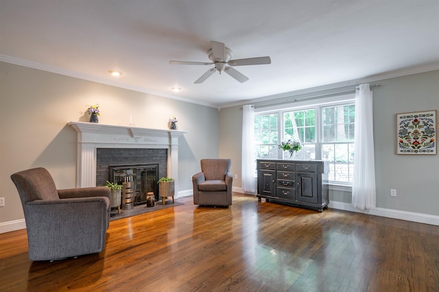 35 Fletcher Ln, Hollis, NH 03049 - sitting room with wood finished floors, a ceiling fan, crown molding, a brick fireplace, and recessed lighting