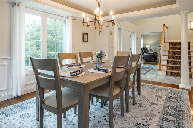 35 Fletcher Ln, Hollis, NH 03049 - dining space featuring wood finished floors, a chandelier, stairway, a tray ceiling, and crown molding
