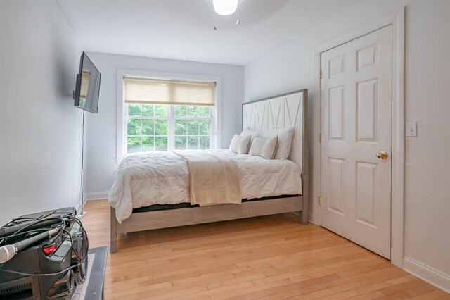 35 Fletcher Ln, Hollis, NH 03049 - bedroom featuring light wood finished floors and ceiling fan